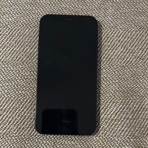 Used Apple Black iPhone 12 mini in original box. Charger and case included.